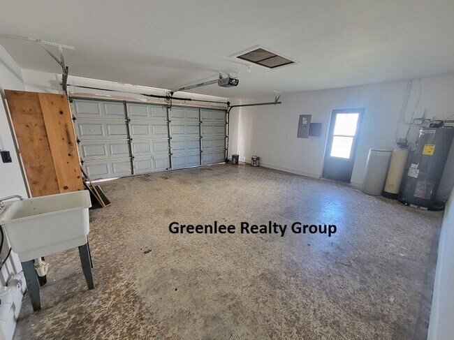 Building Photo - Relax by the water in this spacious 2-bedroom home with a 2-car garage, nestled in the highly des...