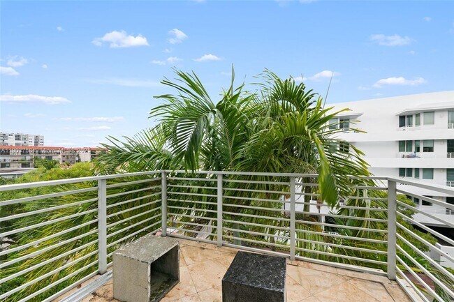 Building Photo - 7744 Collins Ave