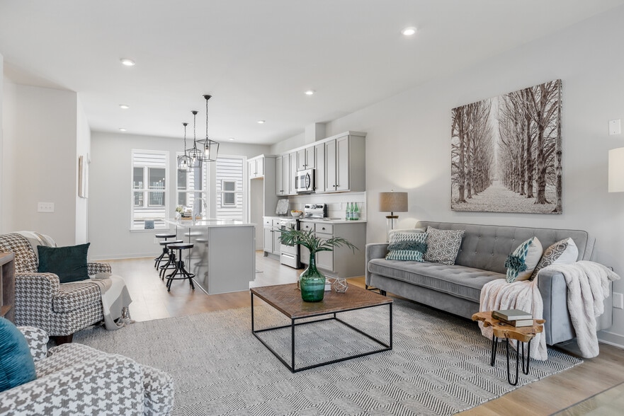 Thoughtfully designed 2nd floor open layout connects the living area to a chef-inspired kitchen. - 358 E Village Ln