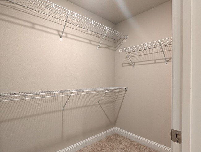 Building Photo - PREMIUM PRICE, PREMIUM FINISHES AND FULLY FENCED REAR YARD - THIS 3/2/2 IN THE DESIRABLE GATED DO...