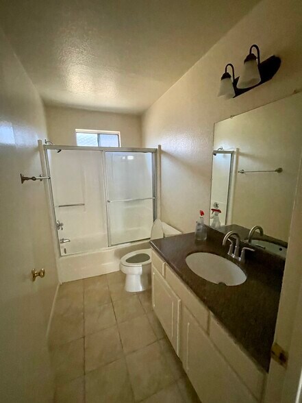 1 bathroom with tiled floor - 10960 Bluffside Dr