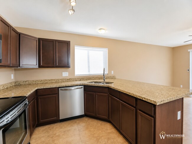 Building Photo - Spacious 3-Bedroom, 3-Bath Home in North Ranch with Community Pool & Amenities