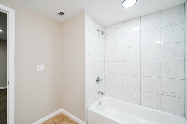 Building Photo - Move in Promo- $300 off First Month's Rent! Renovated 3BR Gem in Dora!