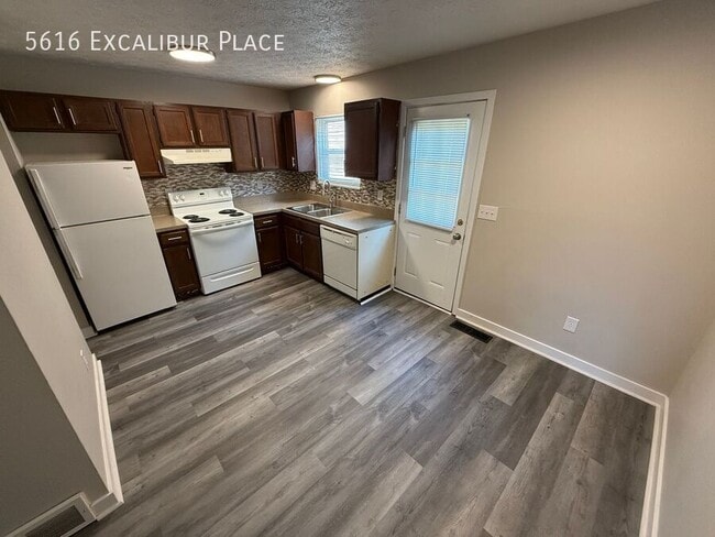 Building Photo - 5616 Excalibur Pl