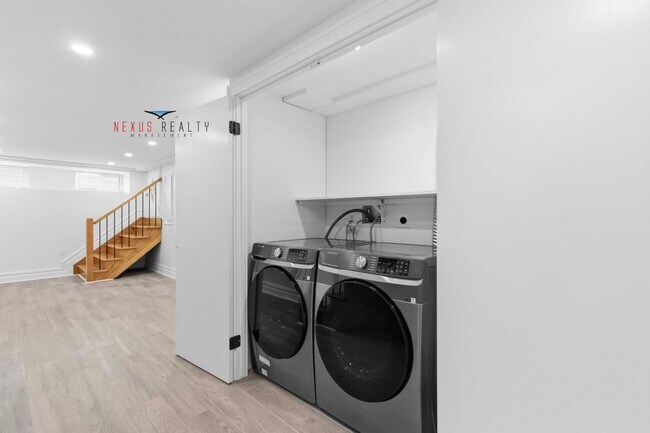 Building Photo - 21-28-28 48th St