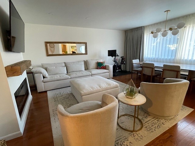 Living and Dining Room with Fireplace - 144 Swan Ln