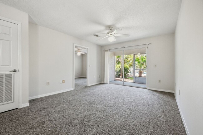 Building Photo - Highly Sought After GROUND-FLOOR Unit at Florida Club!  Pool View!!