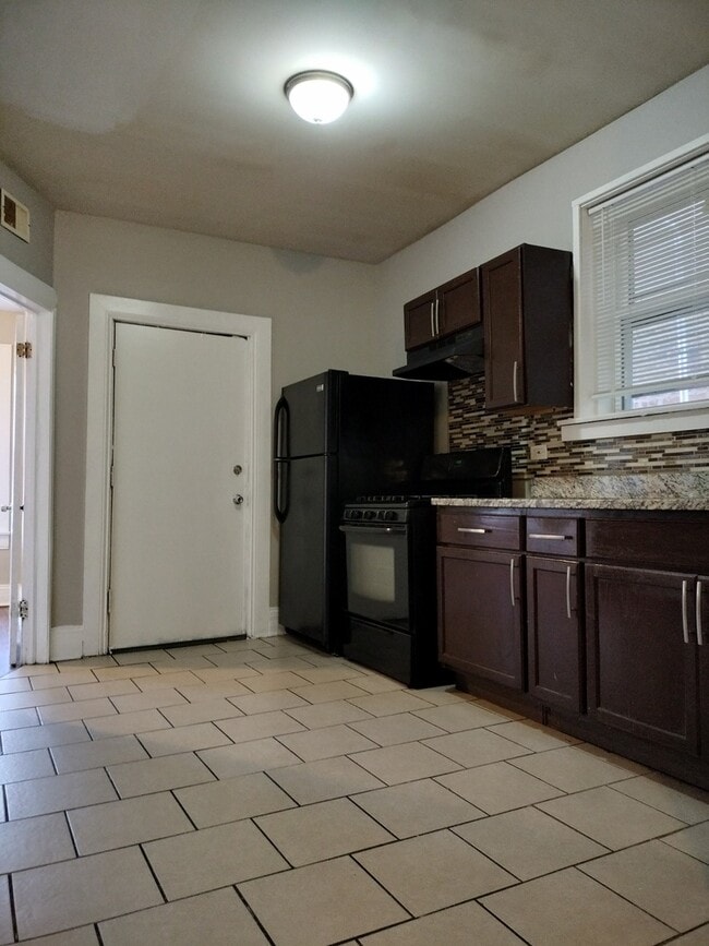 Building Photo - 7729 S Essex Ave