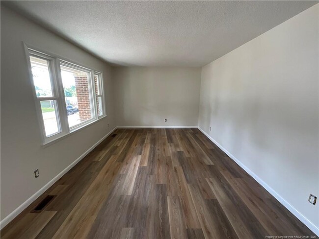 Building Photo - 5909 McDougal Dr