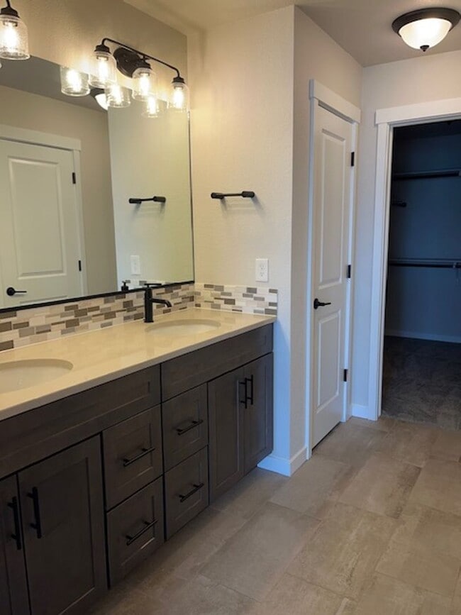 Building Photo - MODERN THREE STORY TOWNHOME WITH 2 CAR GAR...