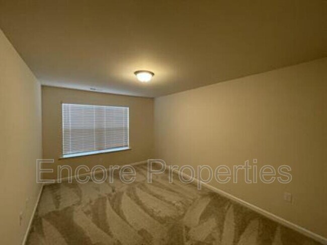 Building Photo - 305 Ribbon Rail St