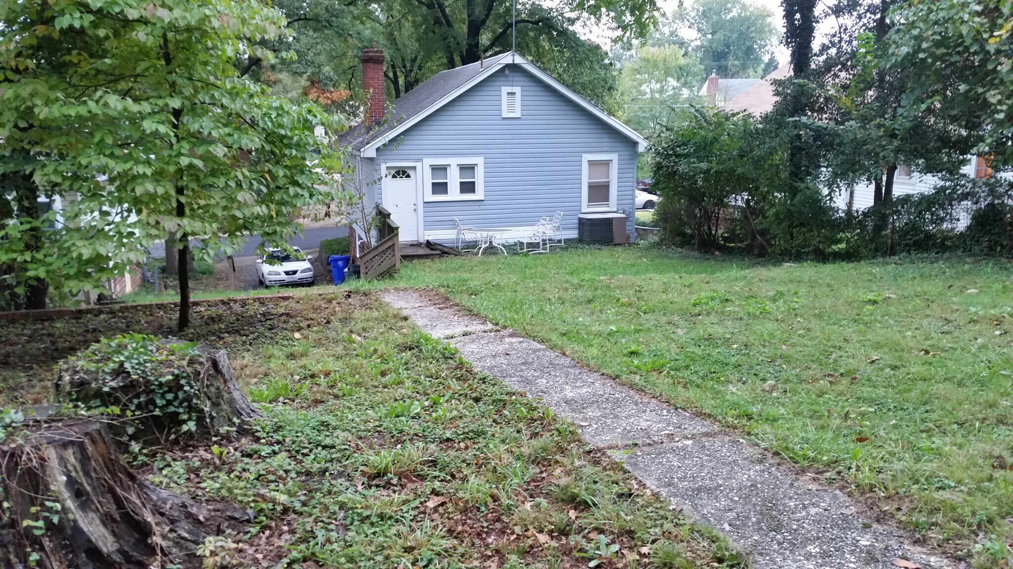 Rear yard , kitchen door at left of picture , off street parking to left of building - 619 Mississippi Ave