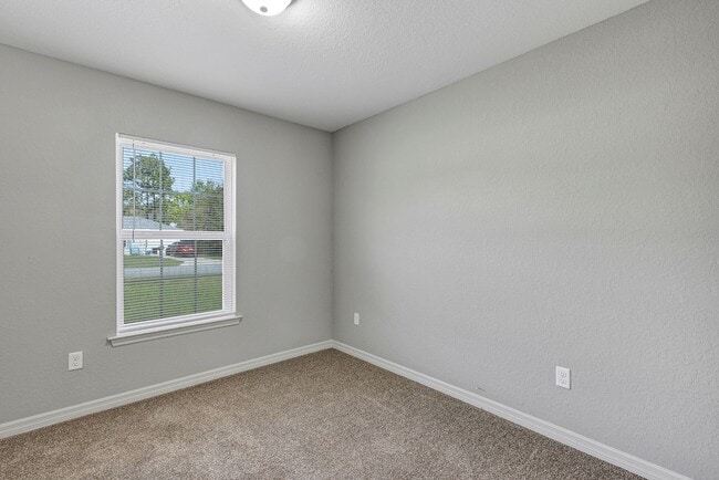 Building Photo - Freshly Painted 3BR Home with Spacious Yard, Modern Baths & No Deposit Option!