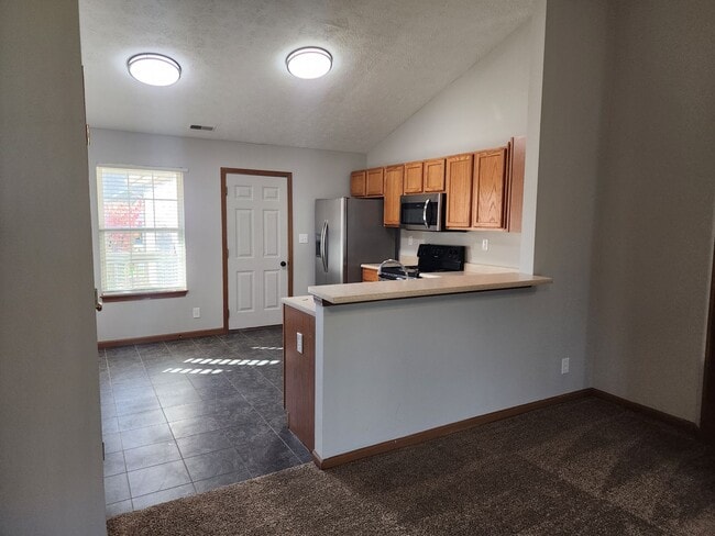 Building Photo - Spacious 2-Bed, 2-Bath Duplex with Attache...