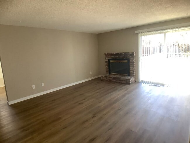 Building Photo - Three bedroom home with large yard| Available July!