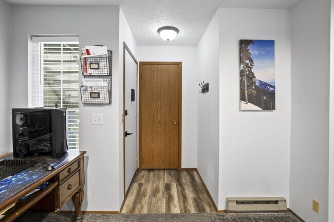 Building Photo - The epitome of carefree condo life is righ...