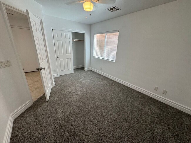 Building Photo - STUNNING 2 STORY HOME IN A GUARD GATED COM...