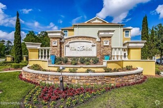 Building Photo - Luxurious 2-Bed/2-Bath Resort-Style Condo ...