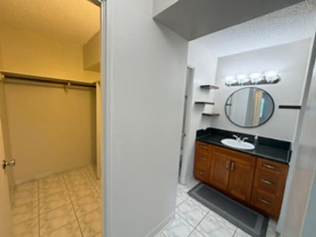 Building Photo - Welcome to your new home at Pearlridge Gardens & Tower! This 1-bedroom, 1-bathroom condo $2,100