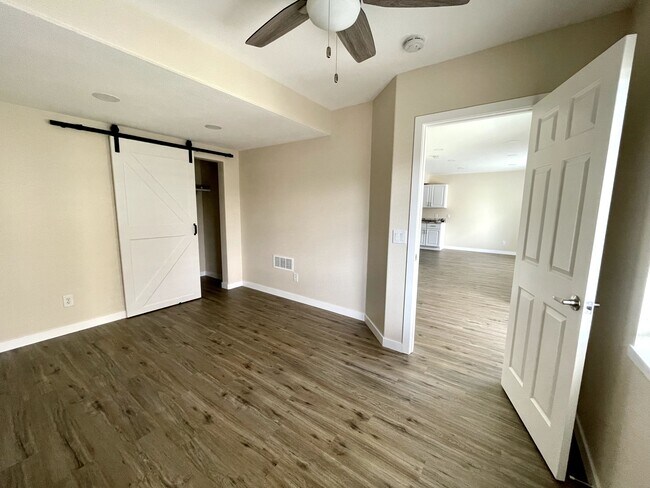 Front bedroom with fan and extra recessed lighting - 12838 Arezzo Cir