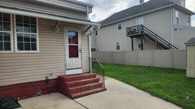 Building Photo - Corner 1st and 2nd flr. unit with central ...