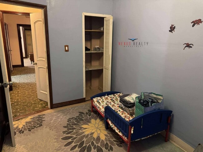 Building Photo - 26-28-28 96th St