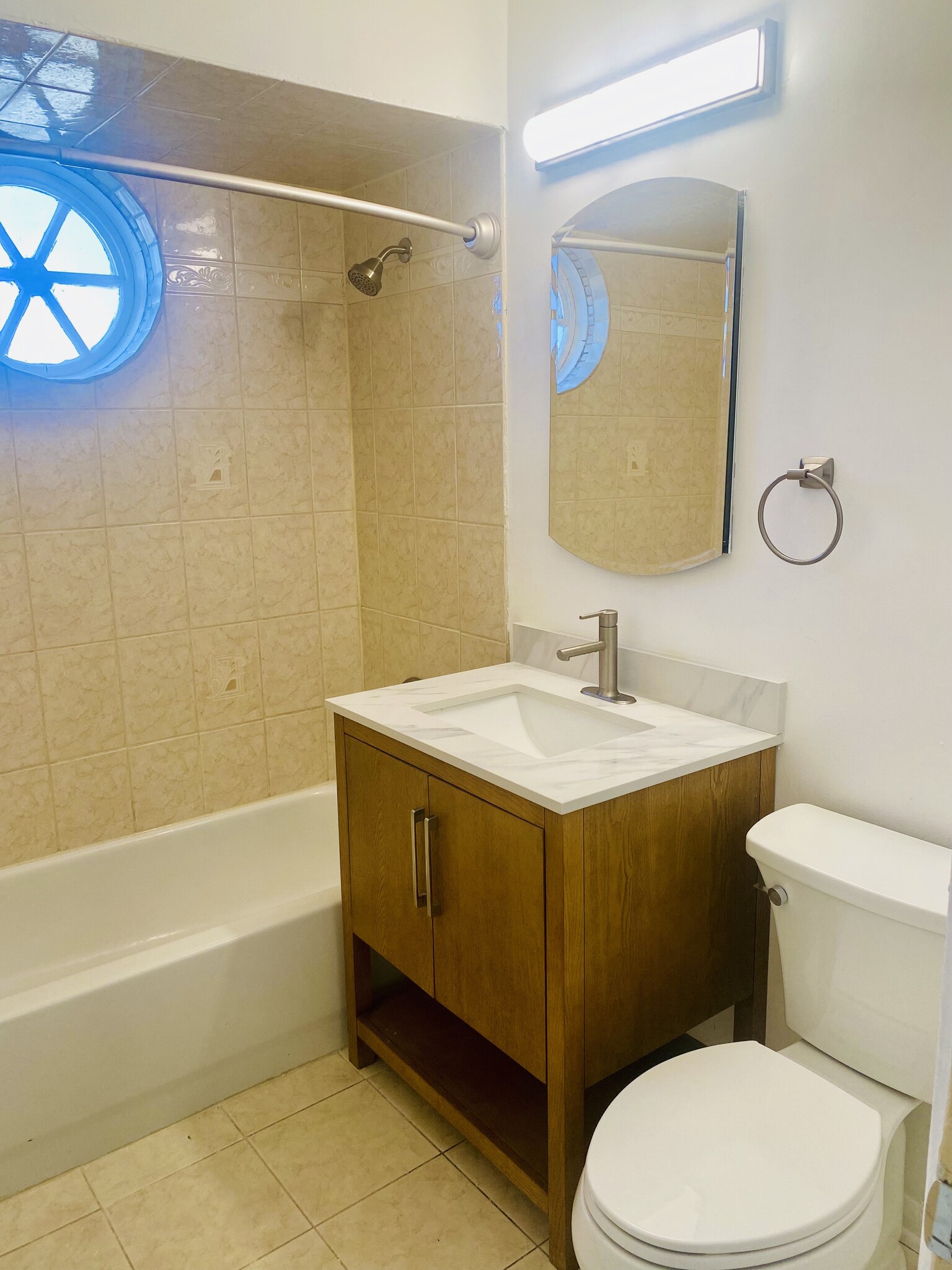 New vanity, mirrored cabinet and latrine. - 417 W Miner St