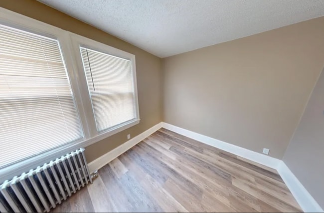 Building Photo - Renovated Twin Home Now Available for Immediate Move In