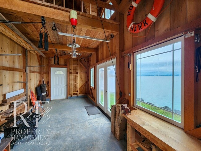 Building Photo - MOVE-IN SPECIAL: 50% OFF FIRST MONTHS RENT - Waterfront Rustic Retreat with Vaulted Ceilings, Pic...