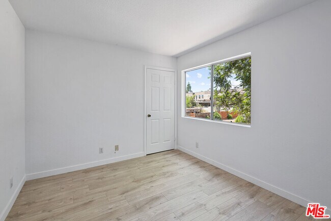 Building Photo - 8473 Penfield Ave