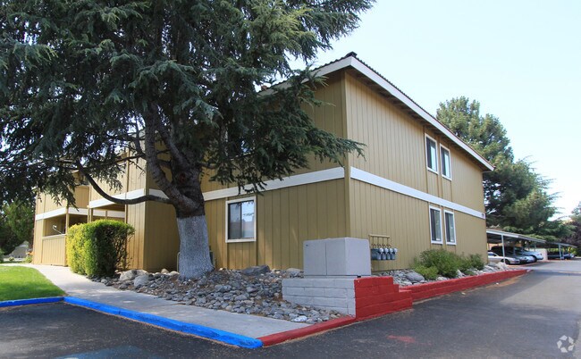 Building Photo - Sand Pebble/Spanish Oaks Village