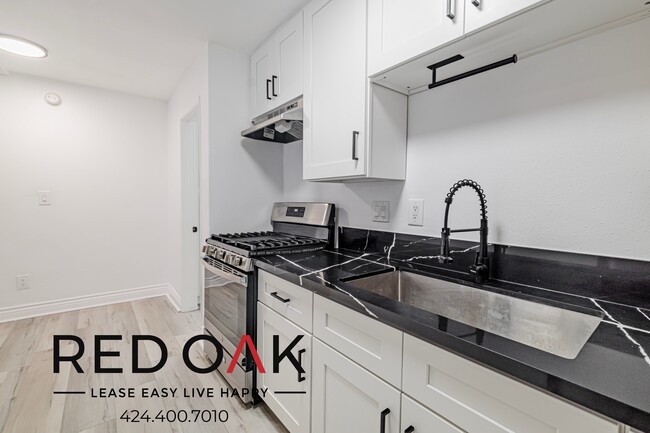 Building Photo - 6555 1/4 La Mirada Ave-10
