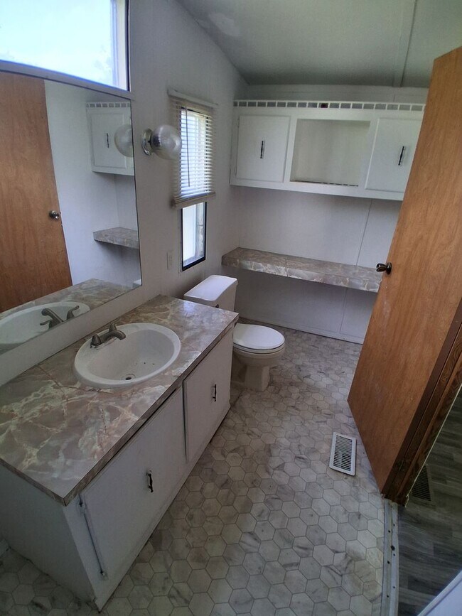 Building Photo - East Village Mobile Home Community