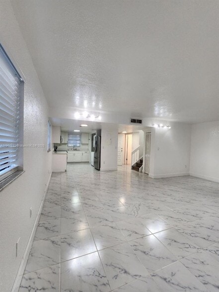 Building Photo - 5100 W 12th Ln