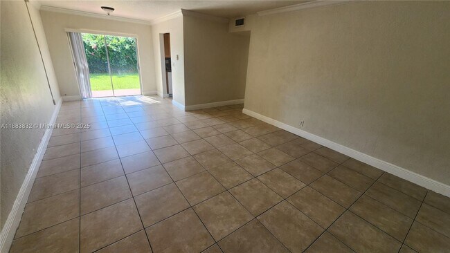 Building Photo - 3090 Coral Springs Dr