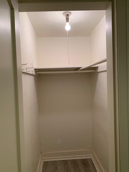 View of master bedroom closet. - 24606 University Ave