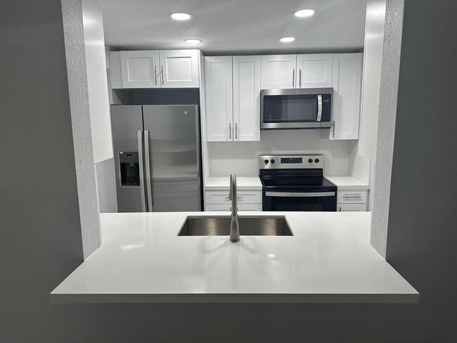 Building Photo - 9430 Boca Cove Cir