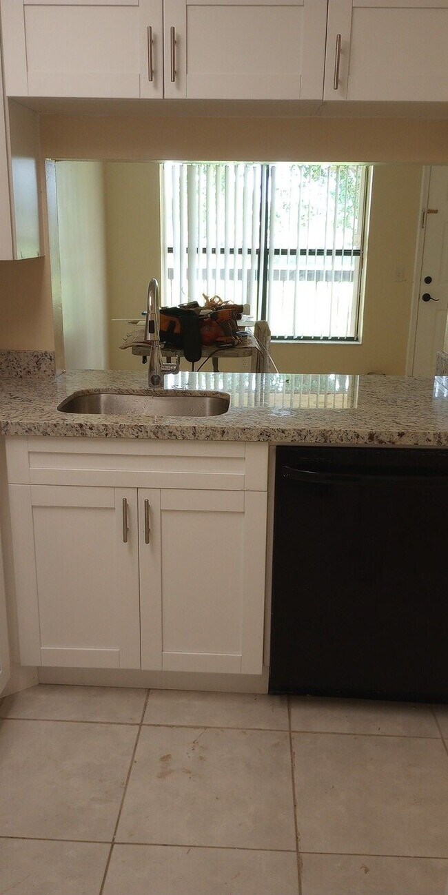 Building Photo - 10011 NW 4th St