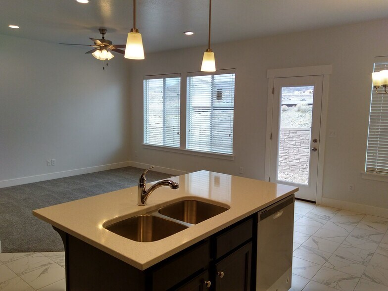 Kitchen and Living room - 14576 S Quiet Shade Drive