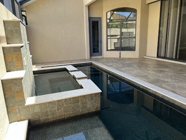 Building Photo - "Elegant 3-Bed, 3-Bath Home with a heated ...