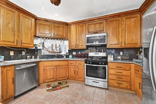 Building Photo - 13523 Pasa Robles Ln