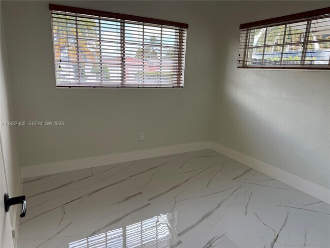 Building Photo - 11602 NW 58th Ave