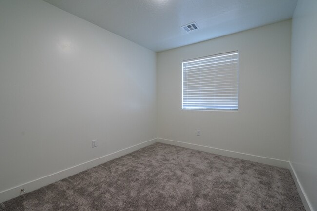 Building Photo - Modern 4-Bed Stand-Alone Home with Fenced Patio