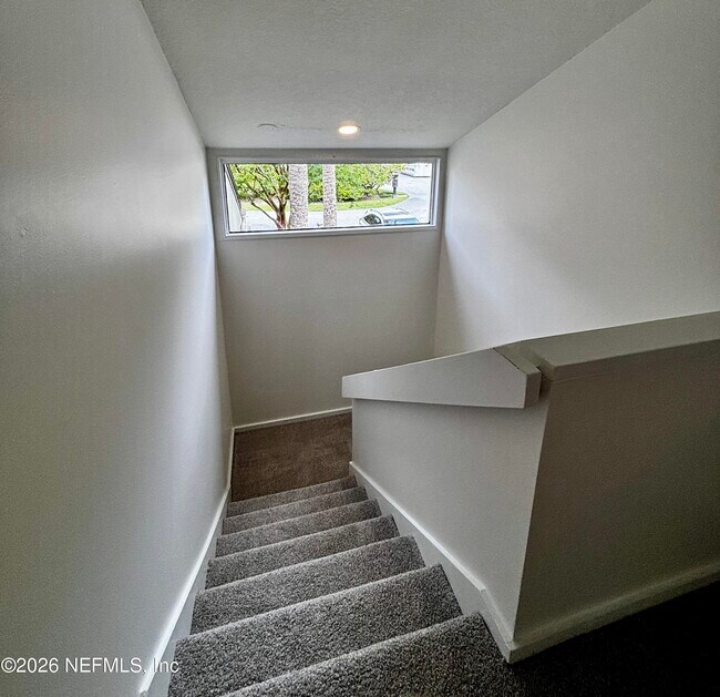 Building Photo - 9787 Sawgrass Dr E