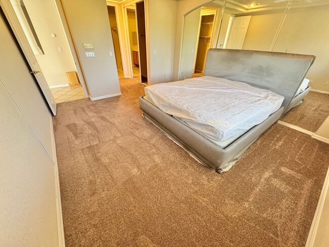 Building Photo - MOVE IN SPECIAL WITH THIS BEAUTIFUL GATED COMMUNITY - TOP FLOOR CONDO WITH BALCONY IN SUMMERLIN