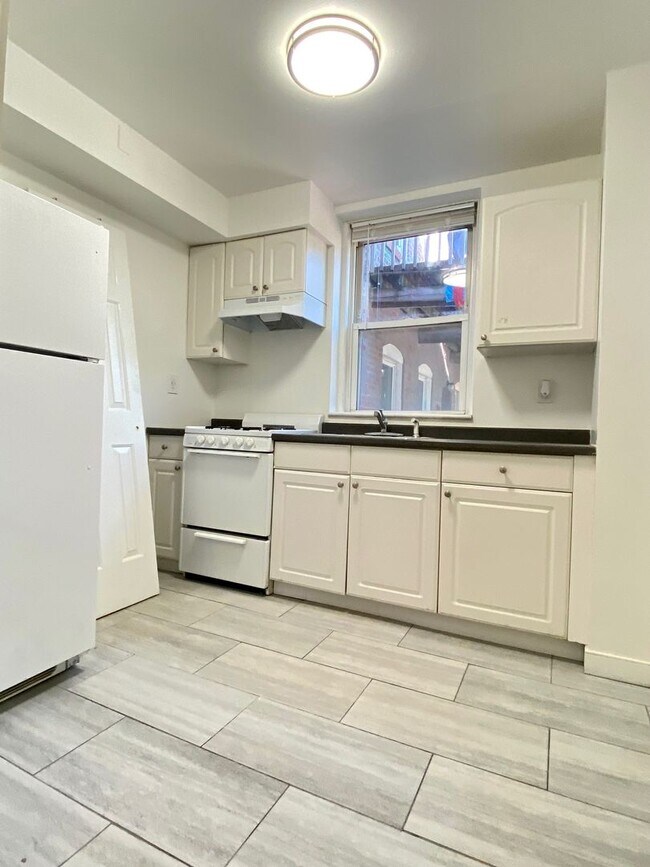 Building Photo - Nicely renovated 2 bed for now.