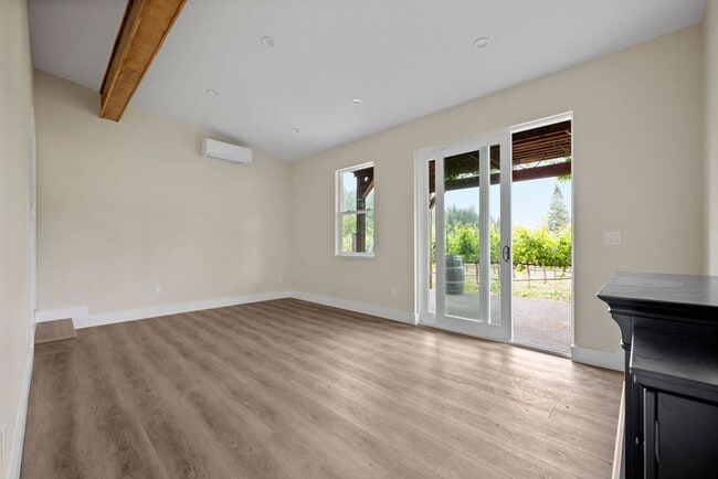 Building Photo - 2 bedroom 2 bath with one car garage on a gated property surrounded by vineyard views Water and S...