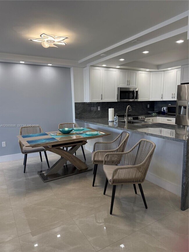 Building Photo - 5701 Collins Ave