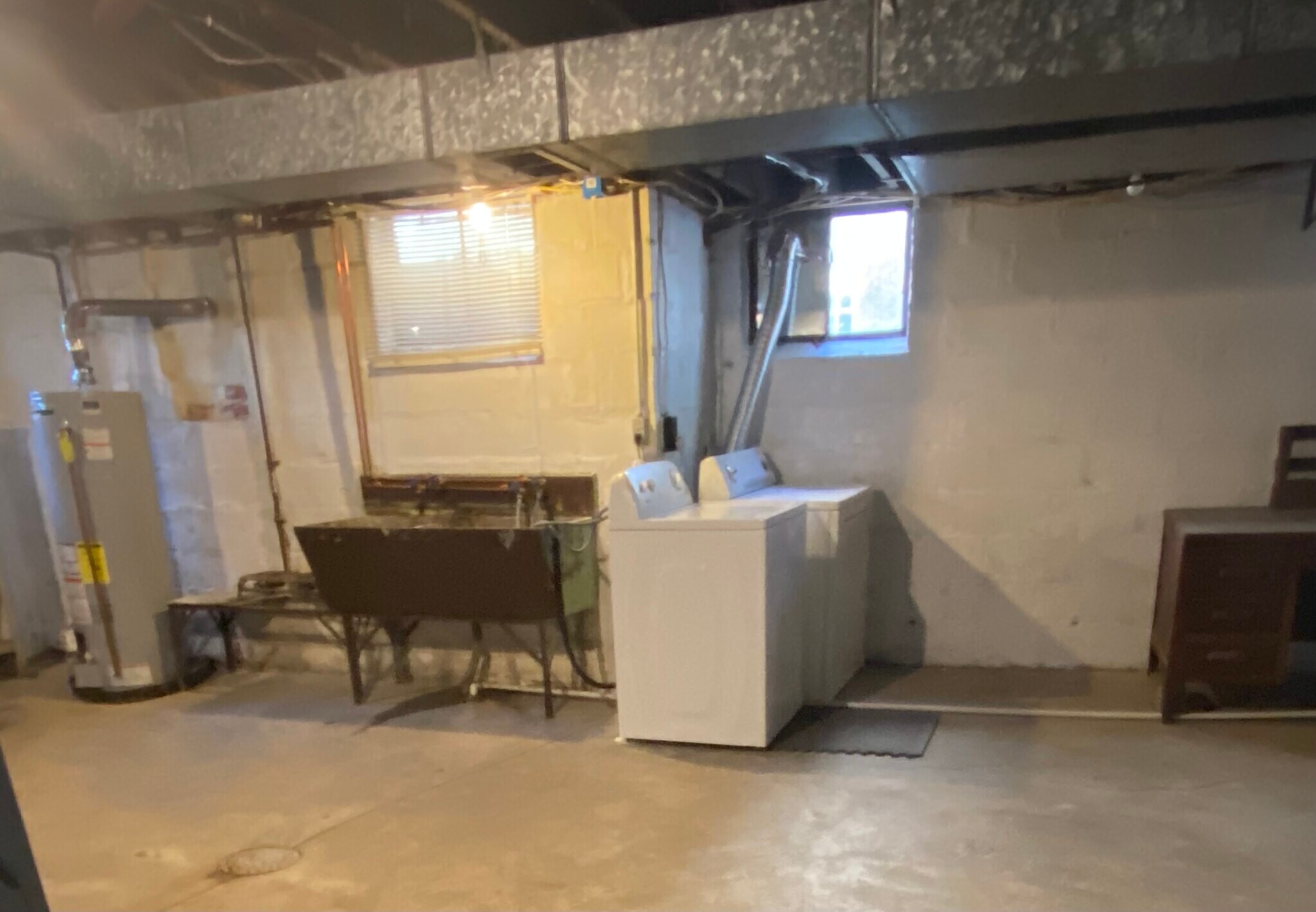 Large lower level with washer dryer and workbench. - 45 Hartweg Ave
