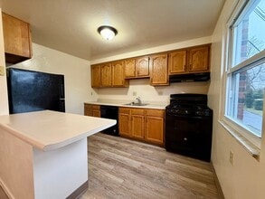 Building Photo - Stunning 2 BR Townhouse with Attached Garage! Central A/C & MORE!! CALL TODAY TO SCHEDULE A TOUR!